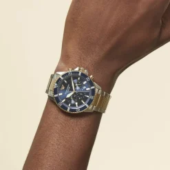 New EMPORIO ARMANI Montre Bleu cadran doré rose/argenté fond bleu bracelet acier argenté/doré