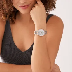 Sale FOSSIL Montre Neutra Nacre cadran argenté fond nacre bracelet acier bicolore