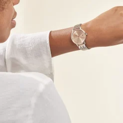 TOMMY HILFIGER Montre Tea Doré cadran argenté fond doré rose bracelet acier bicolore